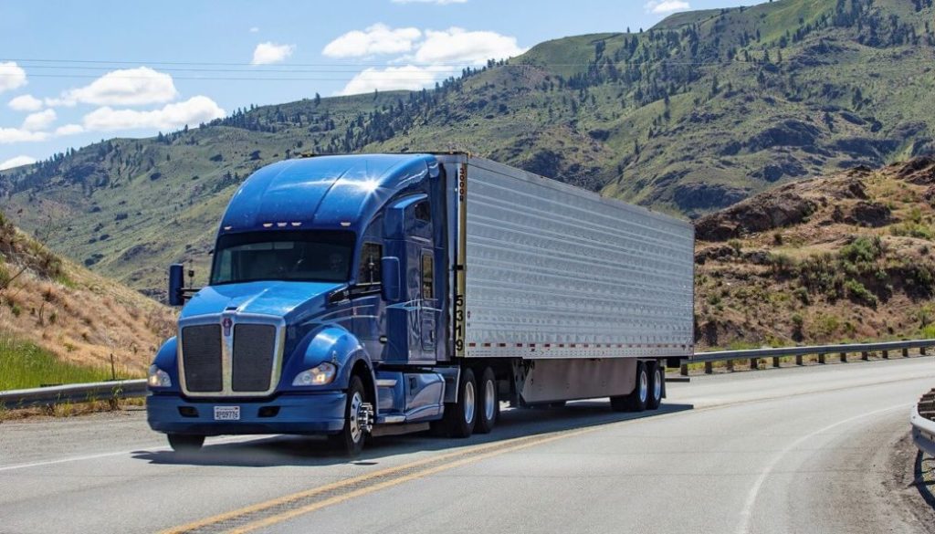 Jay Corporation Inc tractor and trailer ready to depart